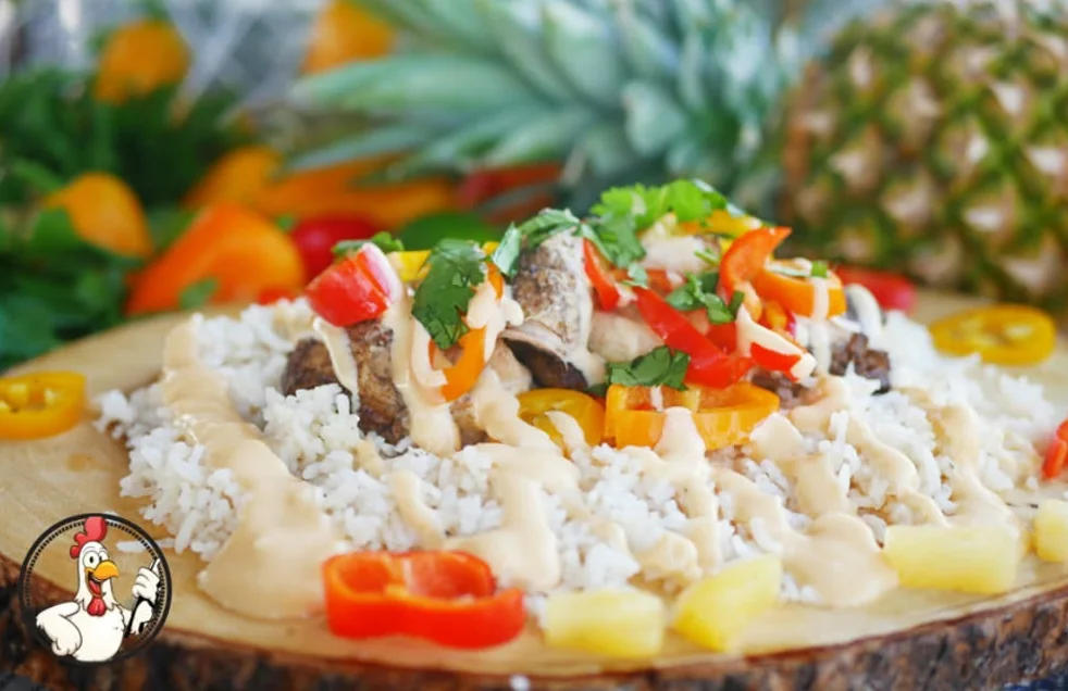 Tropical Chicken Rice Bowl: chicken over rice with peppers, pineapple and aioli